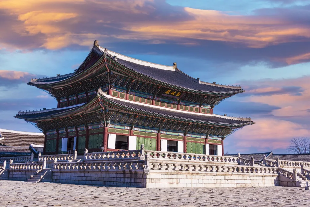 Gyeongbokgung building in the sunset during a tour on Seoul's filming locations.